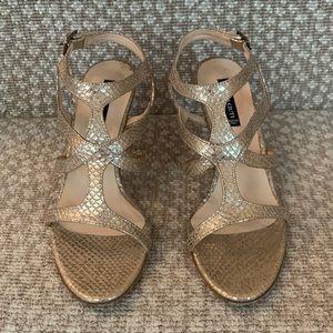 Claudia Ciuti gold snakeskin heels